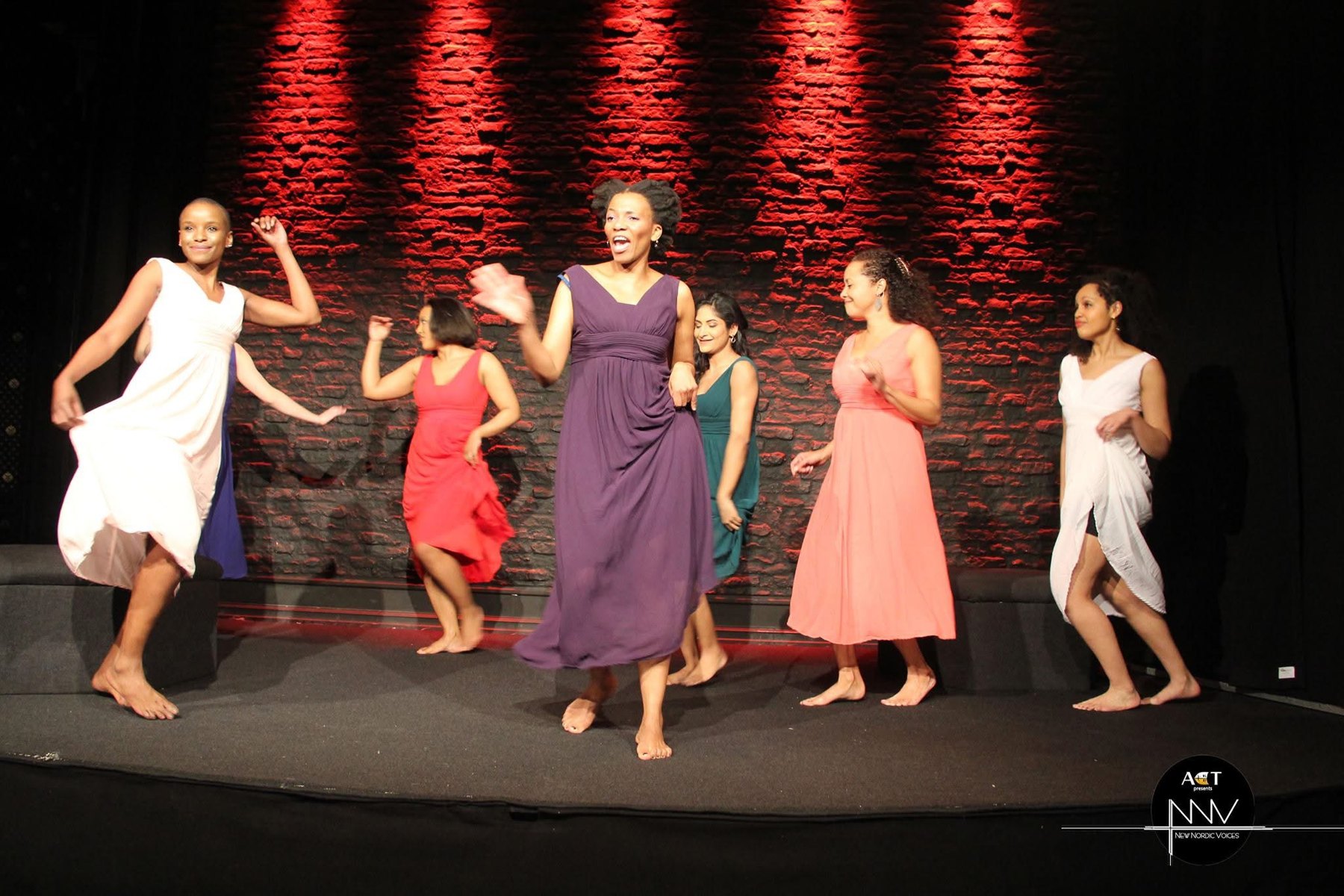 Bright ensemble image from For Colored Girls.