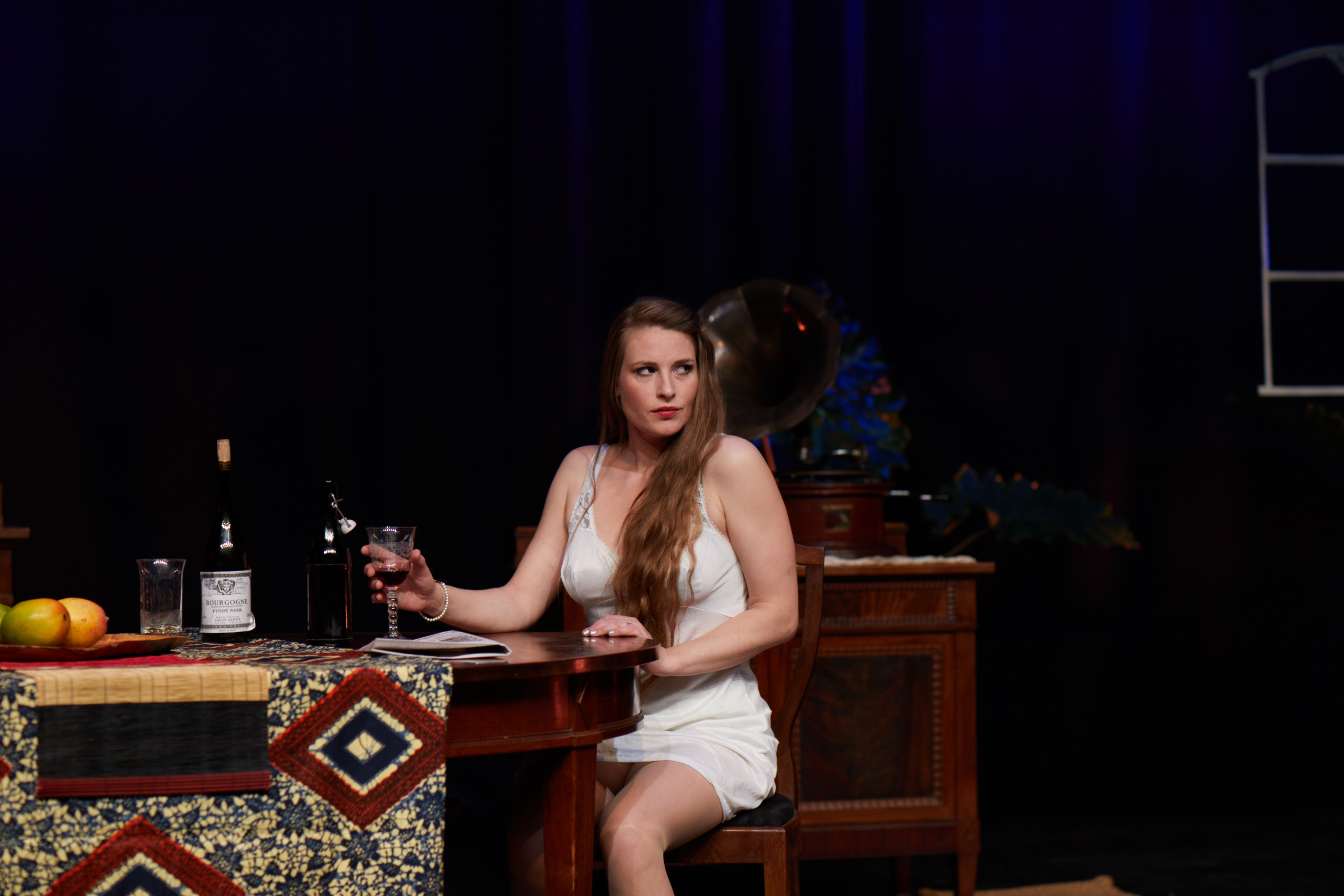 Julie seated at the table.