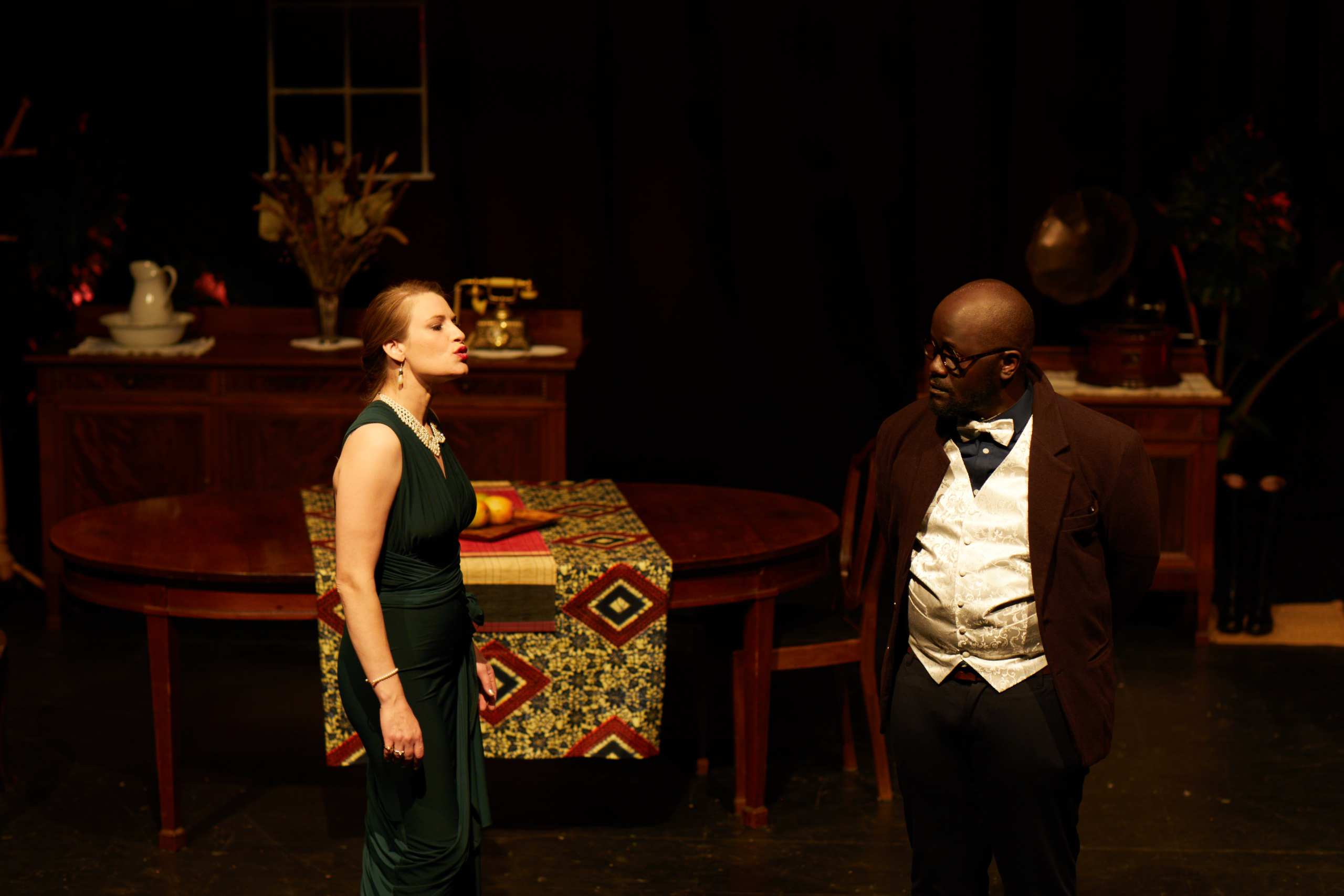 Jean and Julie in a full-stage interior image.